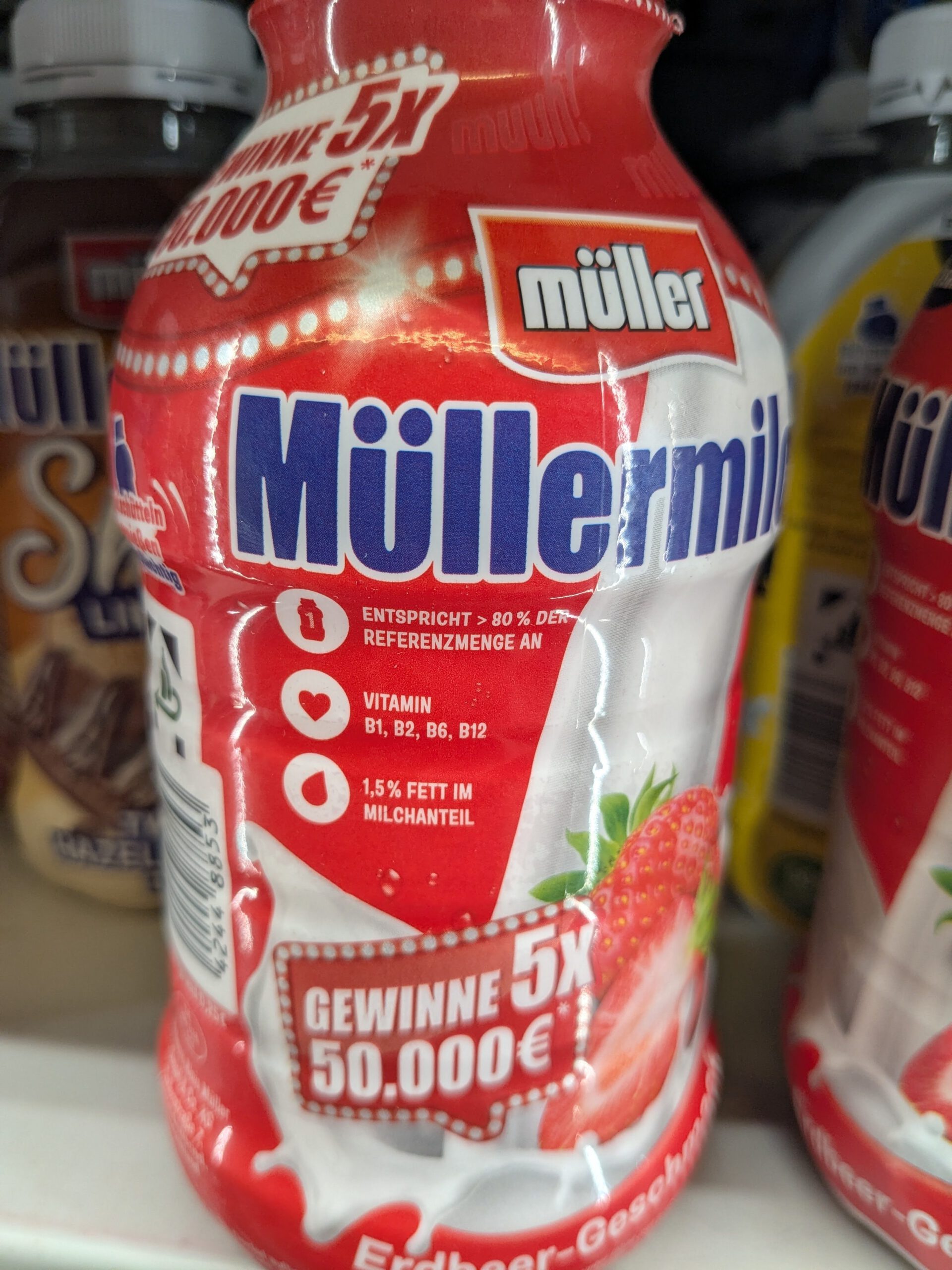 Finde das Muuh – Müllermilch Gewinnspiel Sommer 2025 Müllermilch Gewinnspiel 2025 – Aktionsflasche mit „Finde das Muuh“-Hinweis und 50.000 € Gewinnchance